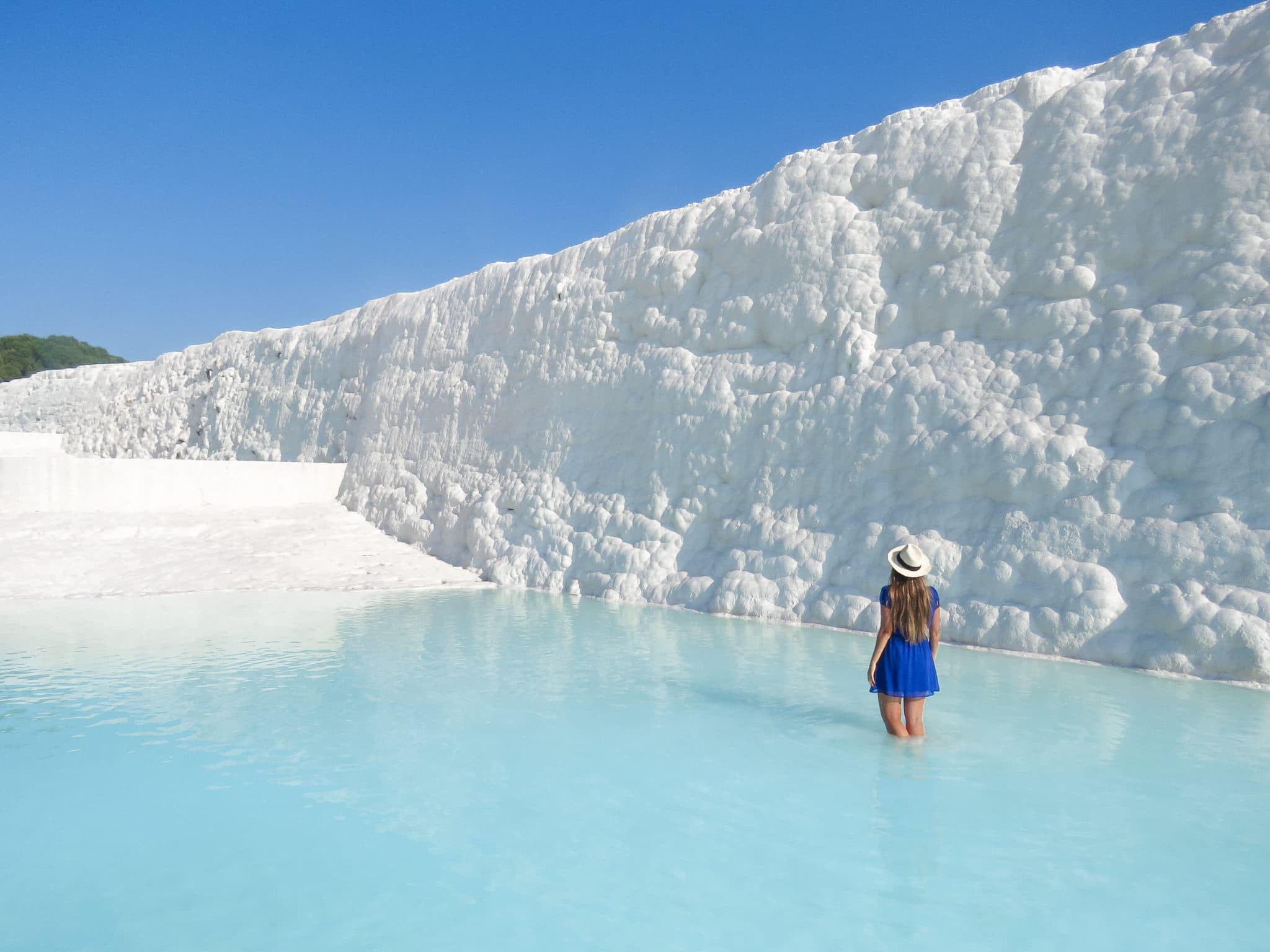 Pamukkale white travertine terraces under sunset — classic day tour highlight.