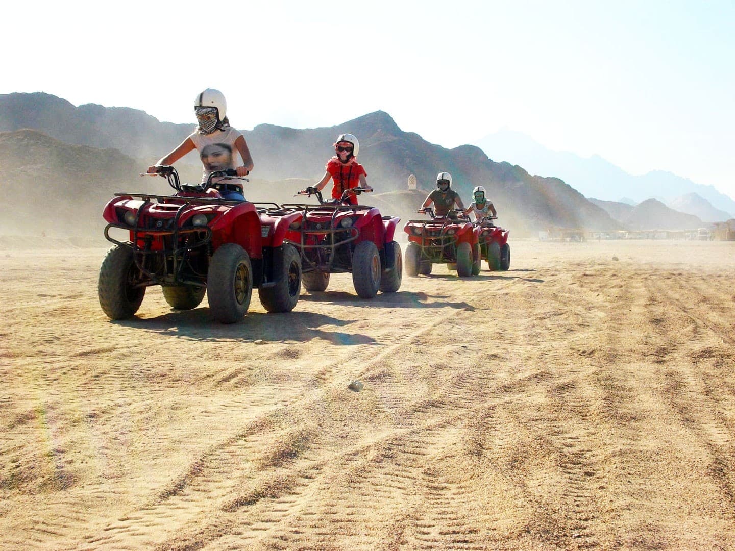 A line of ATV quad bikes ready to head off-road through the pine forests above Kusadasi.