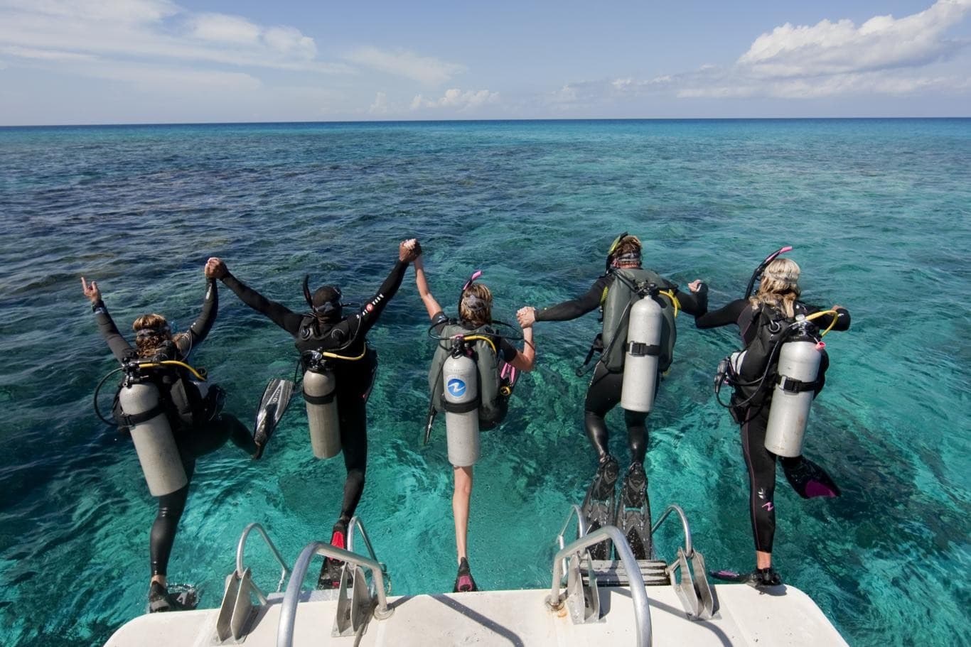 A scuba diver exploring the clear turquoise waters of an Aegean reef near Kusadasi.