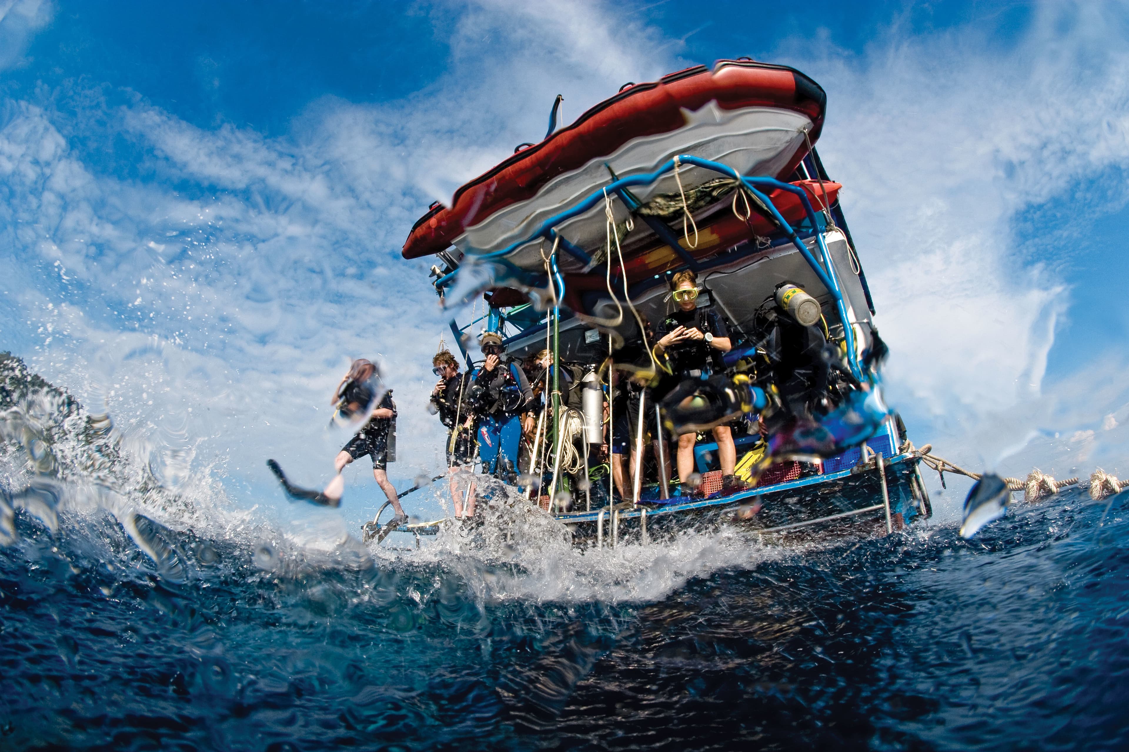 A scuba diver exploring the clear turquoise waters of an Aegean reef near Kusadasi.