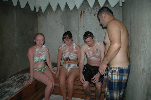 Steam rising over the heated marble göbektaşı of a traditional Turkish hamam.